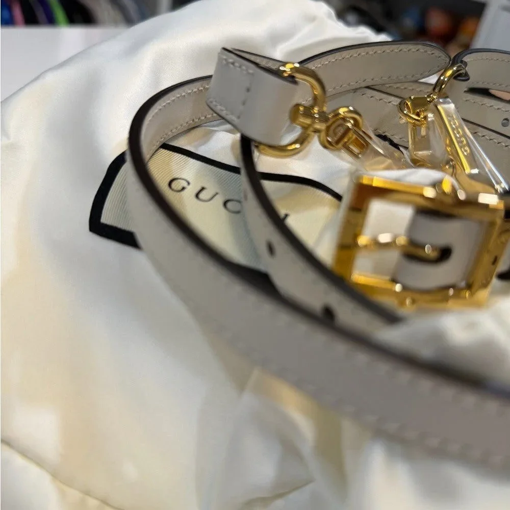 Gucci White leather straps with gold accent - NEW
